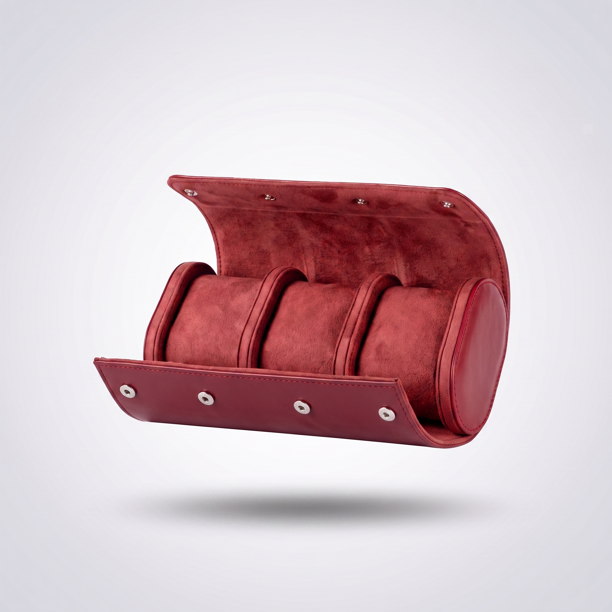 Burgundy Red leather watch roll for three watches, open, showing the red suede cushions