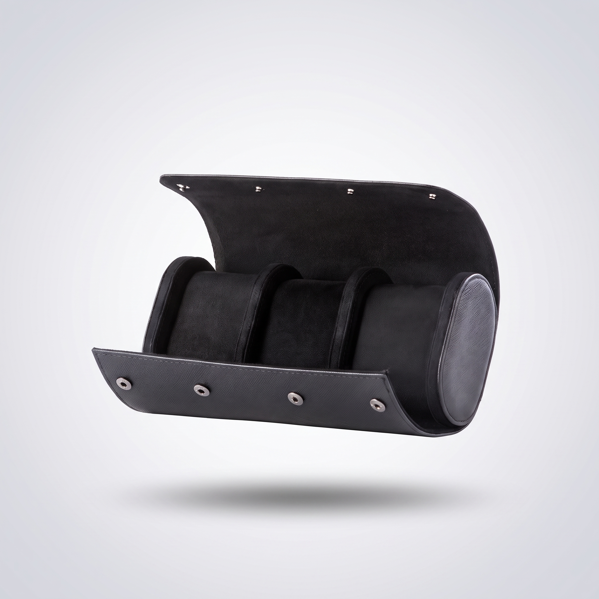 Classic Black leather watch roll for three watches, open, showing the black suede cushions