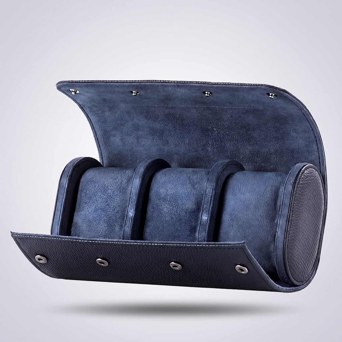 Midnight Blue leather watch roll for three watches, open, showing the navy suede cushions